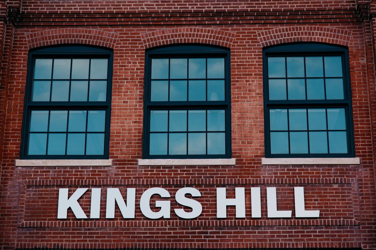 Kings Hill featuring Winco's 1150S series windows finished with black Kynar paint, include a black spacer and muntins to replicate the original windows.